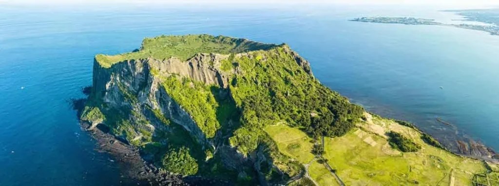 Panoramic view of Seongsan Ilchulbong and the surrounding coastline